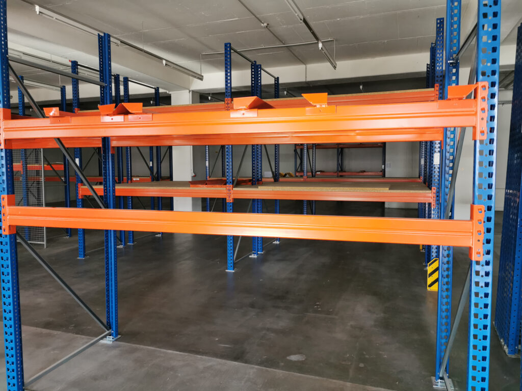 Empty,Heavy,Duty,Racks,In,A,Company,As,Production,Is