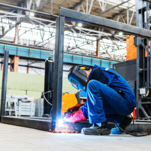 A,Welder,At,An,Industrial,Enterprise,Welds,Metal,Structures,From