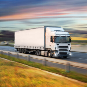 Truck,With,Container,On,Highway,,Cargo,Transportation,Concept.,Shaving,Effect.